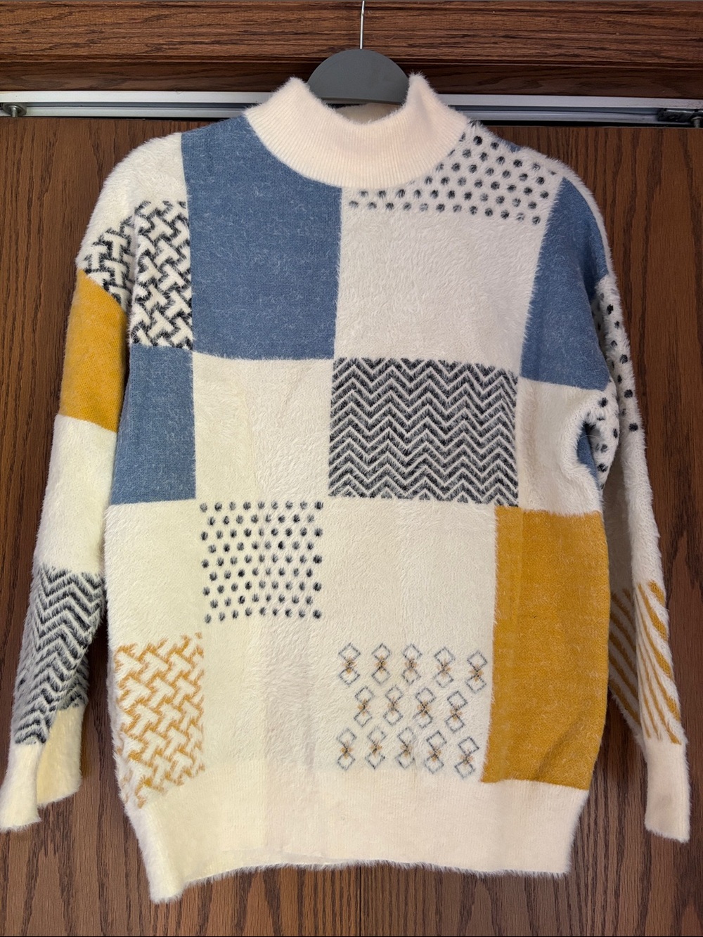 Cozy Patchwork Mock Neck Sweater in Cream, Blue & Mustard